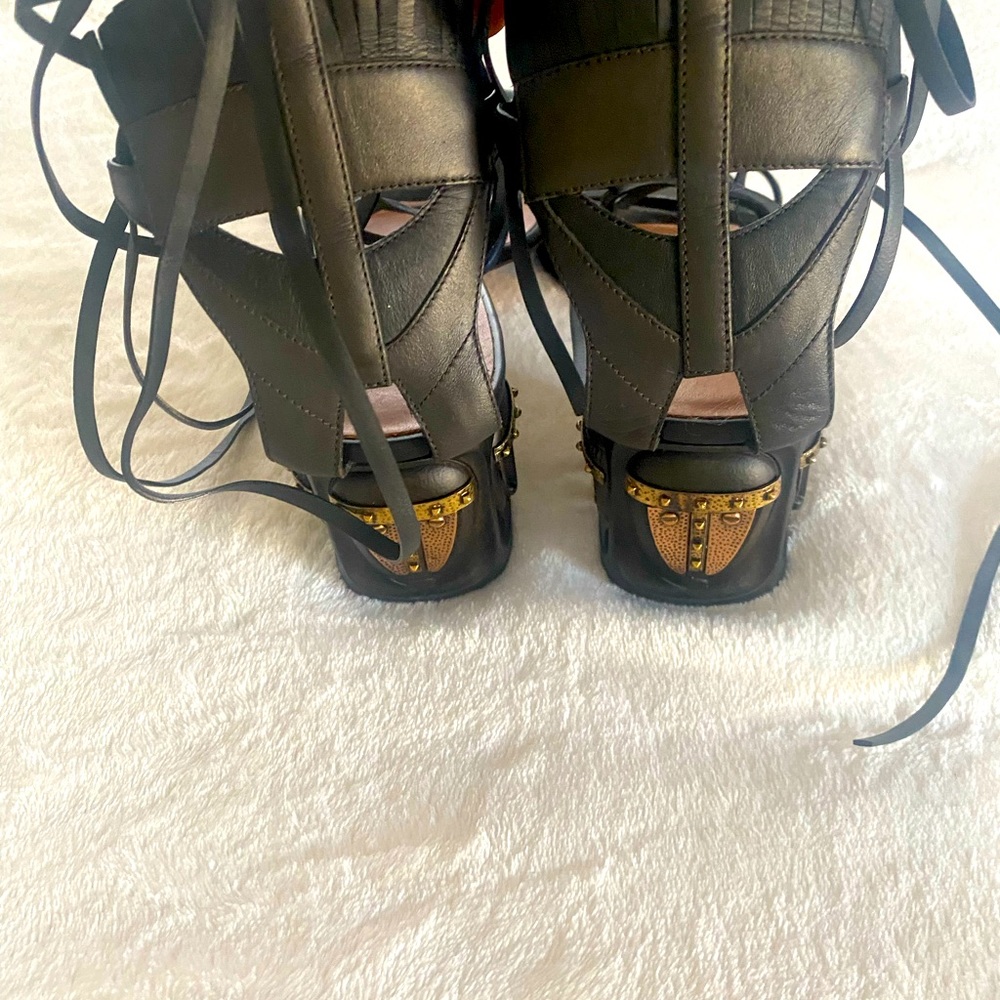 Luxury black leather Valentino sandals.